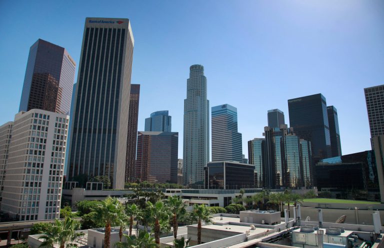 Skyscrapers line the downtown Los Angeles on Monday, Sept. 29, 2014. New skyscrapers will no longer be required to have rooftop helicopter landing pads under a change in city rules allowing alternative safety measures that will enable architects to design buildings with something other than the flat tops mandated since the 1950s. (AP Photo/Richard Vogel)