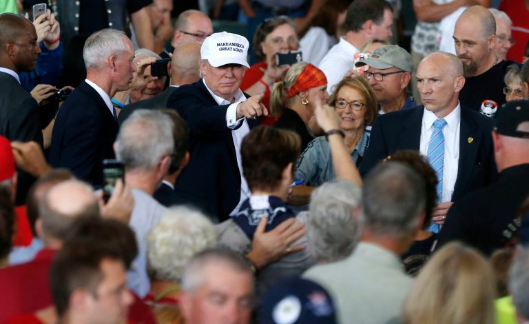 Republican presidential candidate Donald Trump greets the crowd after speaking at Joni's Roast and Ride at the Iowa State Fairgrounds in Des Moines, Iowa. (AP Photo/Gerald Herbert, File)