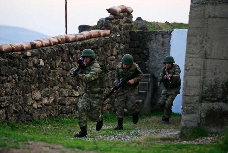 Currently, 6,000 U.S. troops are deployed in Syria and Iraq, mostly in advisory roles. (AP Photo/Lefteris Pitarakis)