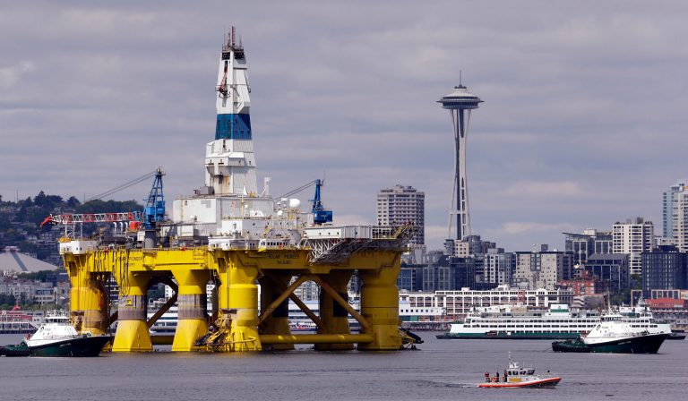 The oil drilling rig Polar Pioneer, shown here as it is towed toward a dock Thursday, May 14, 2015, in Elliott Bay in Seattle has been approved to drill forÂ Arctic oil off the coast of Alaska.Â (AP Photo/Elaine Thompson)