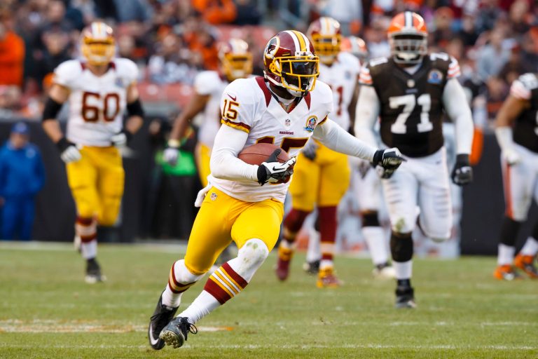 Rick Osentoski/AP
Redskins receiver Josh Morgan played last season with seven screws in his right ankle and torn ligaments in both hands.