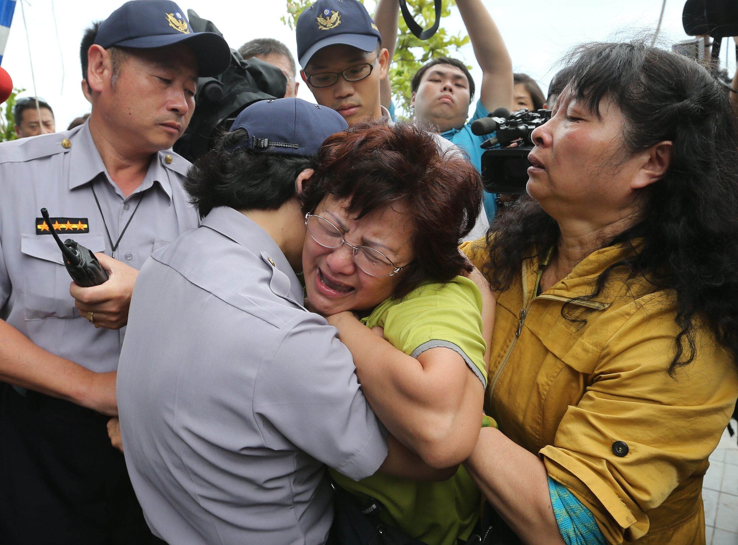 Taiwan searches plane wreckage for clues on crash