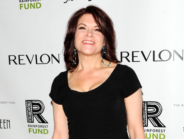 FILE - This April 3, 2012 file photo shows singer Rosanne Cash at the Revlon Concert for the Rainforest Fund dinner and auction in New York. Cash has been a New Yorker for two decades now. Her latest project is taking her out of the city. She's preparing a new album of songs about the American South, and did a lot of traveling with her husband, John Leventhal to get ideas. (AP Photo/Evan Agostini, file)