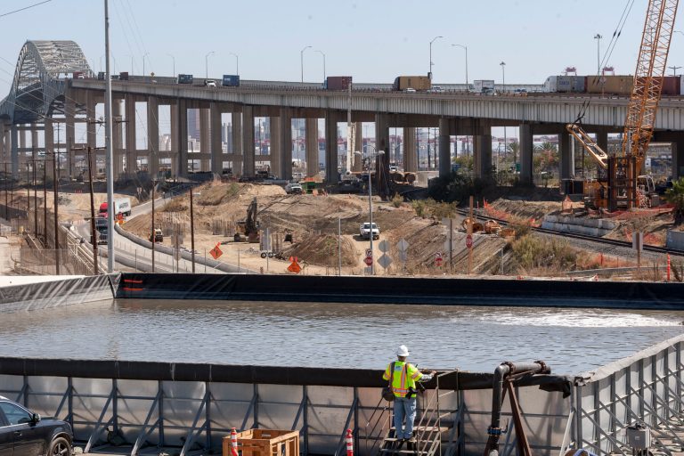 Foundation work begins on 350 foundation piles constructed in the ground at depths down to 175 feet below the surface for the new Gerald Desmond Bridge Replacement Project in the Port of Long Beach in Long Beach, Calif., Wednesday, Oct. 1, 2014. The Gerald Desmond Bridge will be one of the tallest bridges of its kind in the United States. With two 515-foot towers and a cable-stayed design. During the pile construction, crews maintain even pressure of holes to ensure there is no upward movement of groundwater from the deeper layers of multiple aquifers. (AP Photo/Damian Dovarganes)