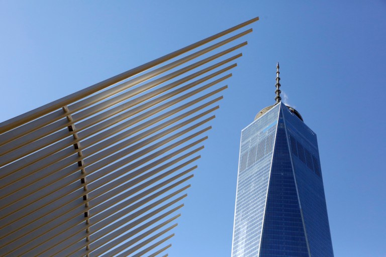 New Yorkers posted photos on social media of what looks like a fire burning on top of One World Trade Center. (AP Photo/Mark Lennihan)