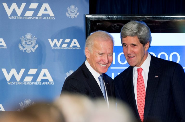Vice President Joe Biden and Secretary of State John Kerry, right, attend a gathering at the State Department in Washington on Friday. (AP Photo/Manuel Balce Ceneta)