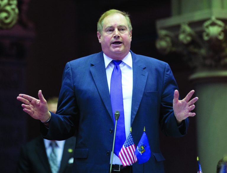Assemblyman Marc Butler, R-Herkimer, debates New York's Secure Ammunition and Firearms Enforcement Act before a vote in the Assembly Chamber at the Capitol on Tuesday, Jan. 15, 2013, in Albany, N.Y. Butler's district includes the Remington Arms Company. (AP Photo/Mike Groll)
