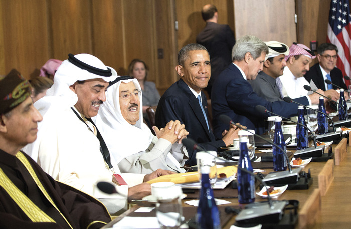 President Obama sits with Kuwaiti Emir Sheikh Sabah Al-Ahmad Al-Sabah, Secretary of State John Kerry, center right, and Gulf Cooperation Council leaders and delegations at Camp David, Md. (AP Photo/Pablo Martinez Monsivais)