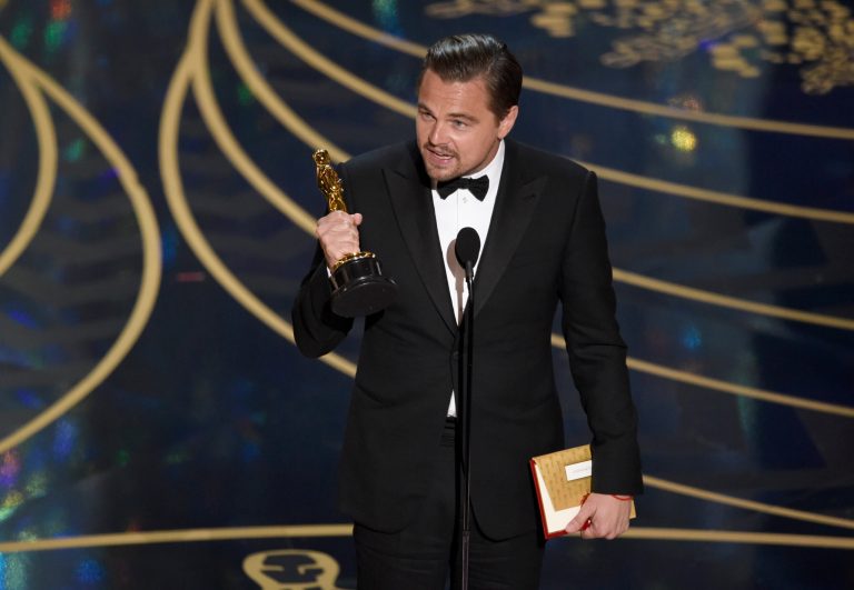 Leonardo DiCaprio accepts the award for best actor in a leading role for 