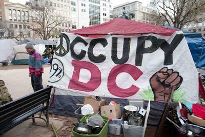 Occupiers charged with assaulting police