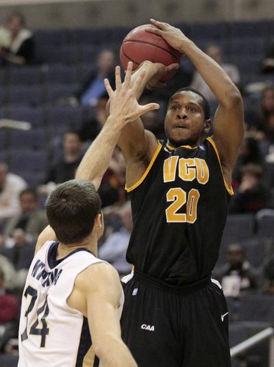 Luis M. Alvarez/AP
Bradford Burgess scored 24 points as VCU beat George Washington on Sunday in the BB&T Classic at Verizon Center.
