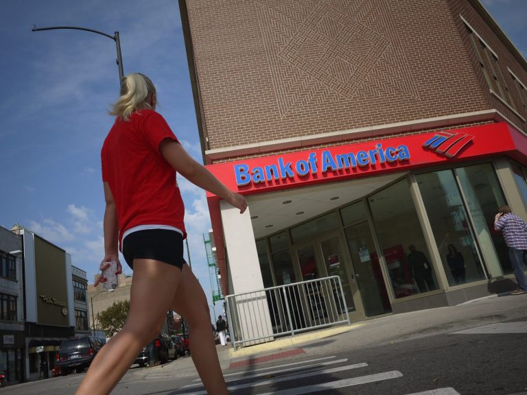A woman walks past a Bank of America branch on September 12, 2011 in Chicago. (Photo by Scott Olson/Getty images)