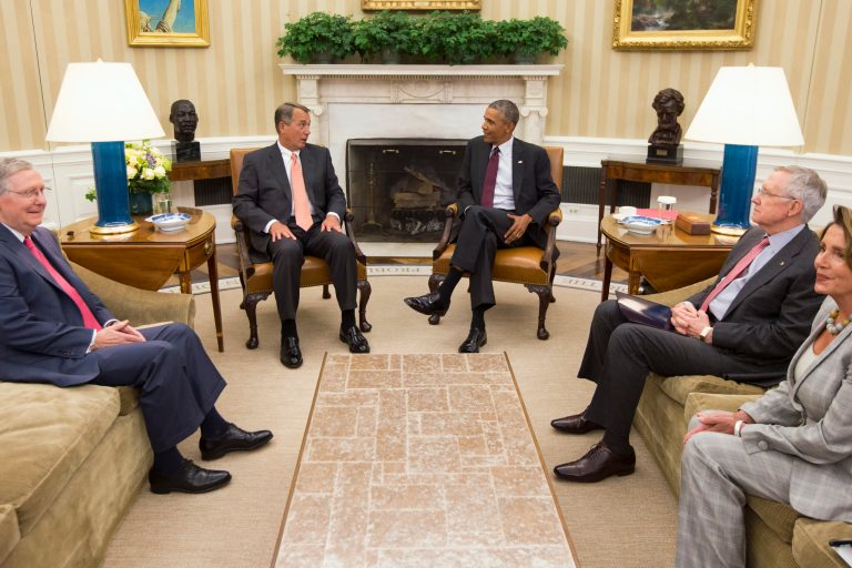 President Barack Obama meets with Congressional leaders in the Oval Office of the White House in Washington, Tuesday, Sept. 9, 2014, to discuss options for combating the Islamic State. From left are, Senate Minority Leader Mitch McConnell of Ky., House Speaker John Boehner of Ohio, the president, Senate Majority Leader Harry Reid of Nev., and House Minority Leader Nancy Pelosi of Calif. (AP Photo/Evan Vucci)