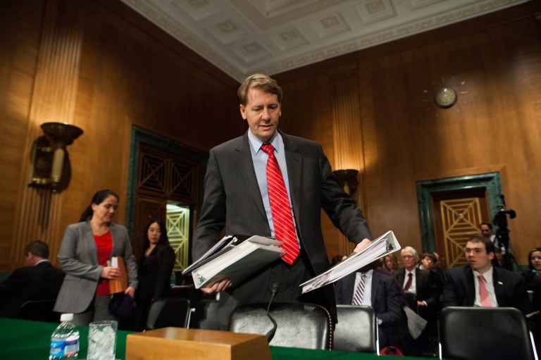 Richard Cordray, director of the Consumer Financial Protection Bureau, arrives at a Banking, Housing, and Urban Affairs Committee Hearing on Capitol Hill, to submit the Consumer Financial Protection Bureau's semi annual report to Congress, Tuesday, November 12th, 2013. (Examiner/Graeme Jennings)