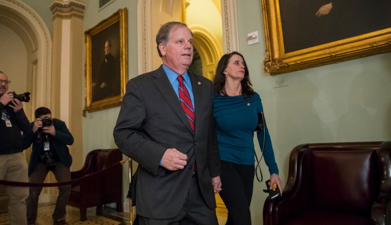 Sen. Doug Jones, D-Ala., said he will support the monthlong stopgap measure to fund the government. (AP Photo/J. Scott Applewhite)
