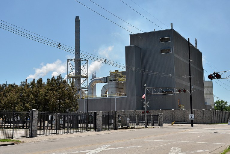 This photo taken Friday, June 13, 2014, shows the exterior of the Grain Processing Corp. processing plant in Muscatine, Iowa. In a major environmental case, the Iowa Supreme Court ruled Friday that residents can bring a nuisance lawsuit against the Grain Processing Corp.,  accused of routinely blanketing their properties with soot and harmful chemicals. (AP Photo/The Muscatine Journal, Beth Van Zandt)