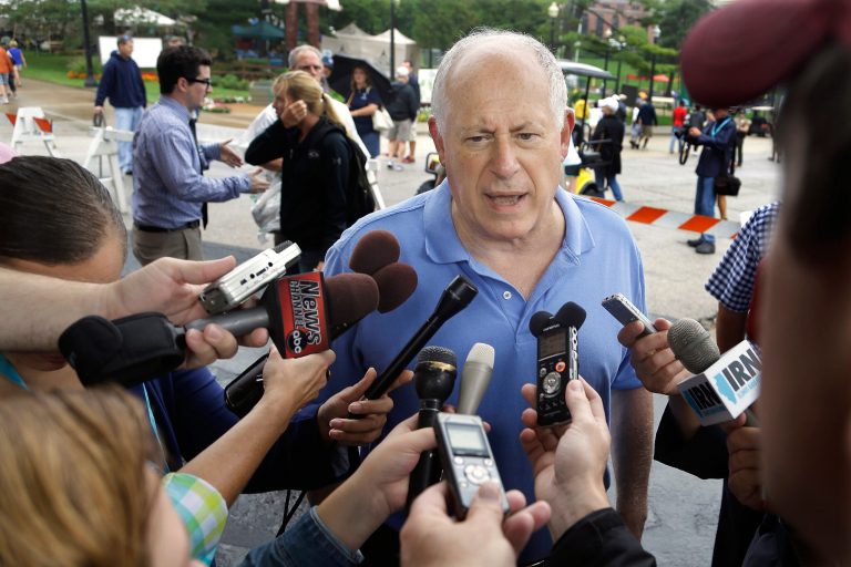 Illinois Gov. Pat Quinn speaks with reporters after opening the Illinois State Fair with a ribbon cutting ceremony Friday, Aug. 8, 2014, in Springfield, Ill. The State Fair will run through Sunday, Aug. 17. (AP Photo/Seth Perlman)