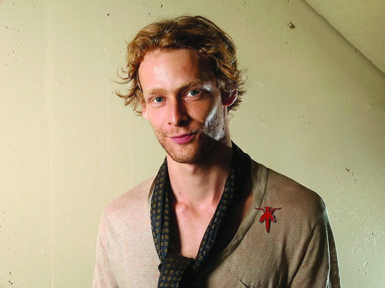 FILE - This Sept. 14, 2011 file photo shows actor Johnny Lewis posing for a portrait during the 36th Toronto International Film Festival in Toronto, Canada. Authorities say Lewis fell to his death after killing an elderly Los Angeles woman. Lewis appeared in the FX television show 