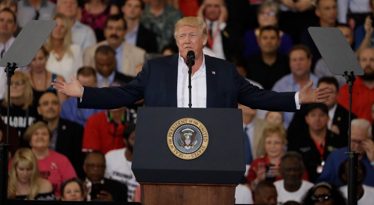 After promises from the White House he won't campaign for Alabama Senate candidate Roy Moore, President Trump will hold a campaign-style rally in Pensacola, Fla., next Friday, just across the Alabama border. (AP Photo/Chris O'Meara)