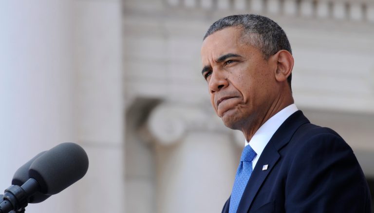 President Barack Obama speaks at Arlington National Cemetery in Arlington, Va., Monday, May 26, 2014.  Obama, who returned just hours earlier from a surprise visit with U.S. troops at Bagram Air Field in Afghanistan, paid tribute to those lost in battle there and elsewhere over history as he commemorated Memorial Day.  (AP Photo/Susan Walsh)