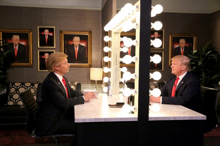 In this image released by NBC, host Jimmy Fallon, left, and Republican presidential candidate Donald Trump appear in the 