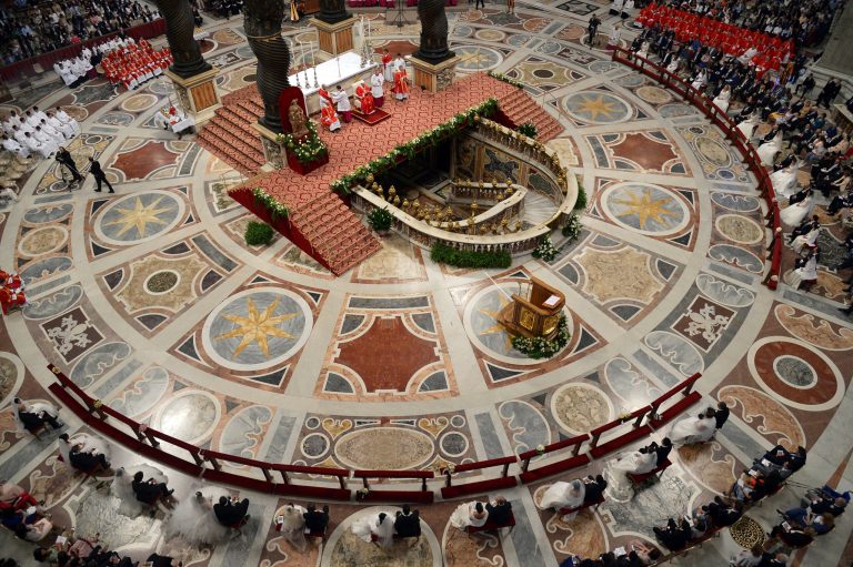 Pope Francis, top center beneath a baldachin, weds twenty couples in St. Peter's Basilica, at the Vatican, Sunday, Sept. 14, 2014. Forty 
