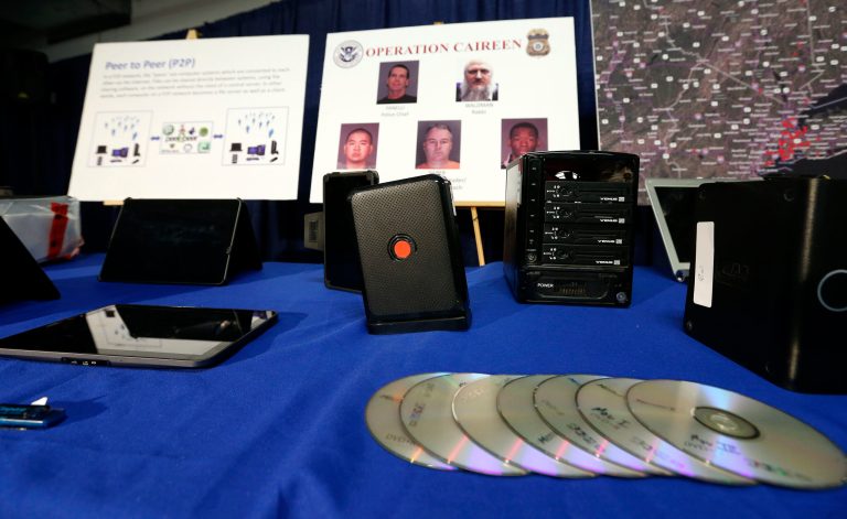 Intelligence officials have made offhand remarks about child porn they have found on agency systems. (AP Photo/Jason DeCrow)