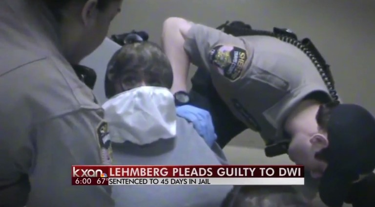 During booking, deputies had to place Travis County District Attorney Rosemary Lehmberg in a restraining chair and place a mask over her face that is usually reserved for inmates who spit on jailers.