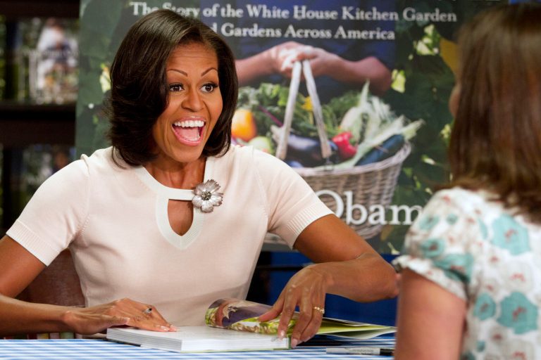   First lady Michelle Obama signs copies of her book 