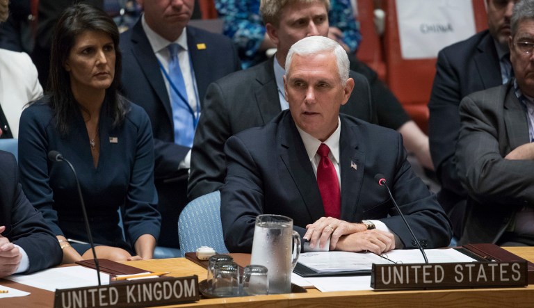 U.S. Ambassador to the United Nations Nikki Haley listens as Vice President Mike Pence at the U.N. Security Council meeting. Pence issued a strong defense of Israel, telling members of the body the UN Human Rights Council has become "a forum for anti-Semitism." (AP Photo/Mary Altaffer)