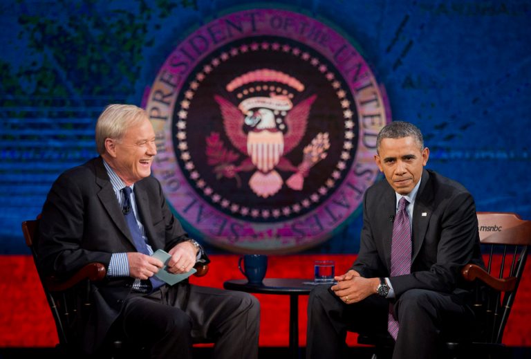 President Barack Obama talks with MSNBC's Chris Matthews during a break in the taping of an interview for the 