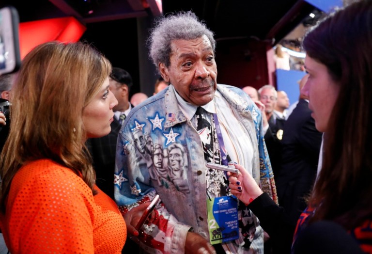 Boxing promoter Don King talks to reporters on the convention floor during the second day of the Republican National Convention in Cleveland, Tuesday, July 19, 2016.