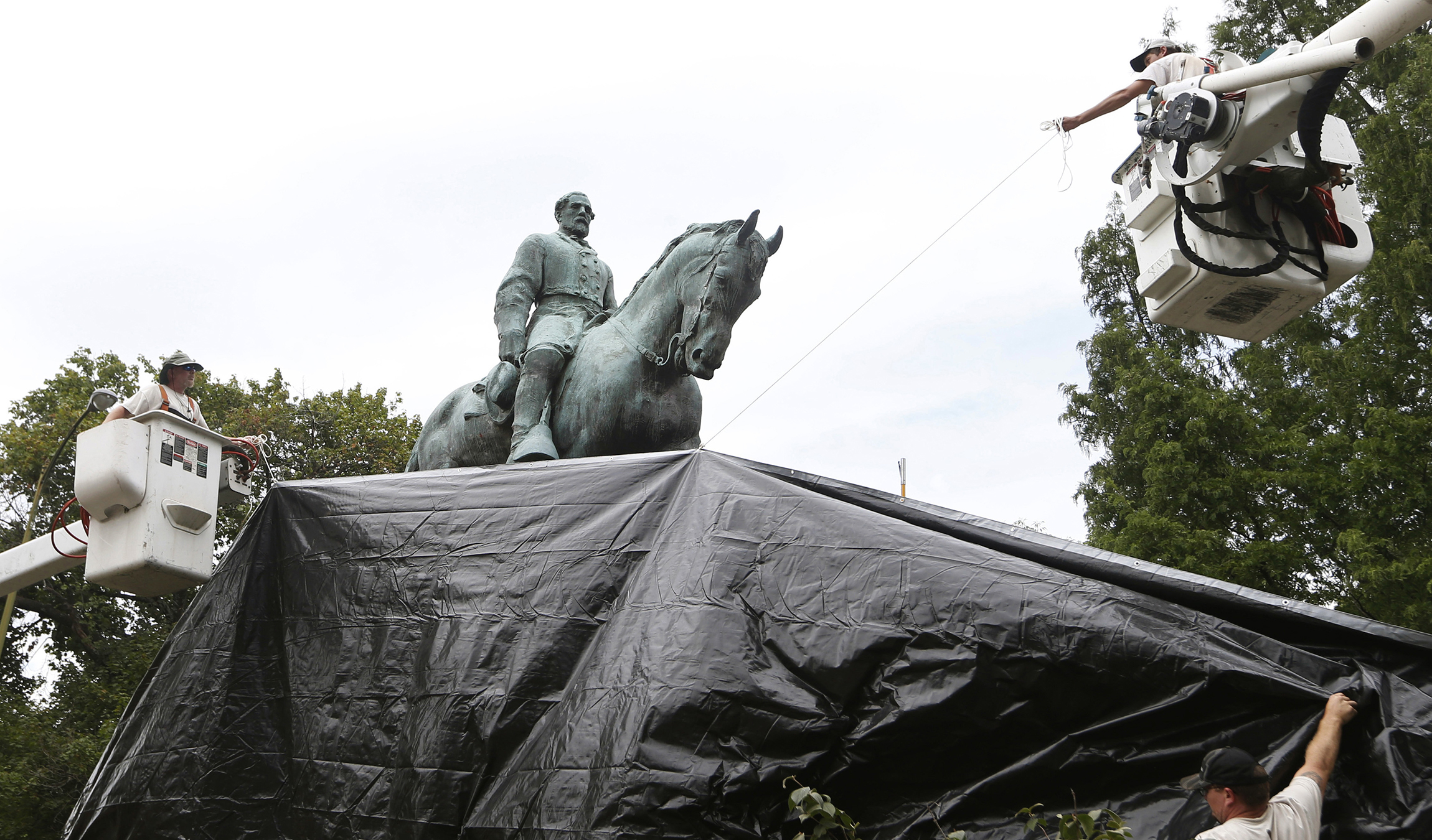 White nationalists return to Charlottesville for brief torch-lit rally
