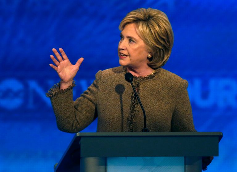 David Muir, one of ABC's debate moderators, asked Hillary Clinton about a Fortune Magazine cover that said big business supported her during her unsuccessful 2008 run for president. (AP Photo)