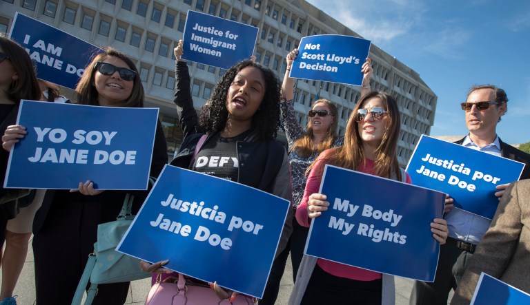 Activists with Planned Parenthood demonstrate in support of a pregnant 17-year-old being held in a Texas facility for unaccompanied immigrant children to obtain an abortion, outside of the Department of Health and Human Services in Washington, Friday, Oct. 20, 2017. (AP Photo/J. Scott Applewhite)