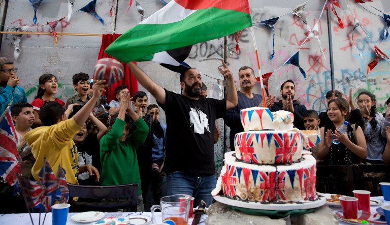 Palestinian activists held a tea party in protest Wednesday. The Balfour Declaration, Britain's promise to Zionists to create a Jewish home in what is now Israel, turns 100 this week, with events in Israel, the Palestinian territories, and Britain drawing attention to the now yellowing document tucked away in London's British Library. (AP Photo/Dusan Vranic)