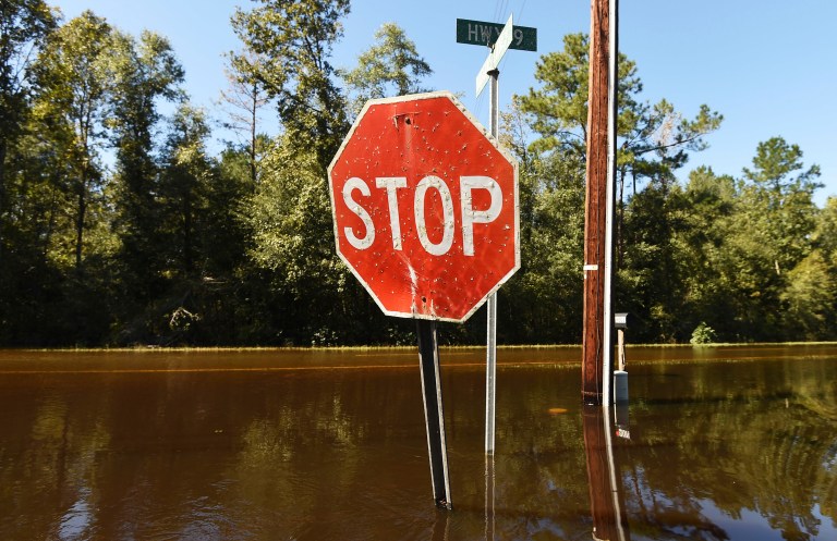 Democratic nominee Hillary Clinton used the hundreds of deaths resulting from Hurricane Matthew to underscore the threat posed by climate change to the nation. (AP Photo/Rainier Ehrhardt)