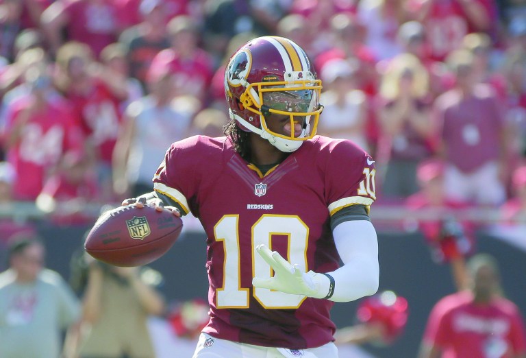 Margaret Bowles/AP
Robert Griffin III completed four passes for 46 yards and ran for 15 more on the Redskins' game-winning drive Sunday.