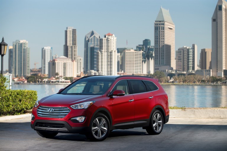 The 2014 Hyundai Santa Fe is seen in an undated photo provided by Hyundai. The 2014 Hyundai Santa Fe mid-size sport utility vehicle stands out from the crowd for its attractive styling, comfortable ride, value pricing, surprising standard features and warranty. (AP Photo/Hyundai)