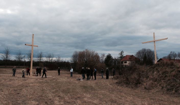 Local police found a dead pig's head, feet and bowels planted on the property. In a previous protest, a group of people put up large crosses near the future site of the mosque. (Twitter)