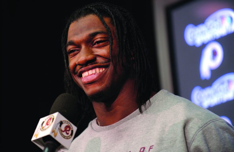 Susan Walsh/AP
Robert Griffin III said it is harder to bend his knee in the brace because it restricts the flexion as well as the extension of the knee.