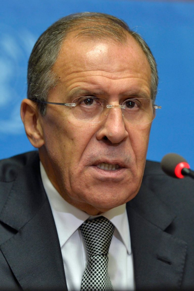 Sergei Lavrov, Russian Foreign Minister, speaks during a press conference after a meeting with U.S. Secretary of State John Kerry and U.N.-Arab League envoy Lakdar Brahimi, both unseen, at the European headquarters of the United Nations in Geneva, Switzerland, Friday, Sept. 13, 2013. Kerry and Lavrov say the prospects for a resumption in the Syria peace process are riding on the outcome of their chemical weapons talks. (AP Photo/Keystone, Martial Trezzini)