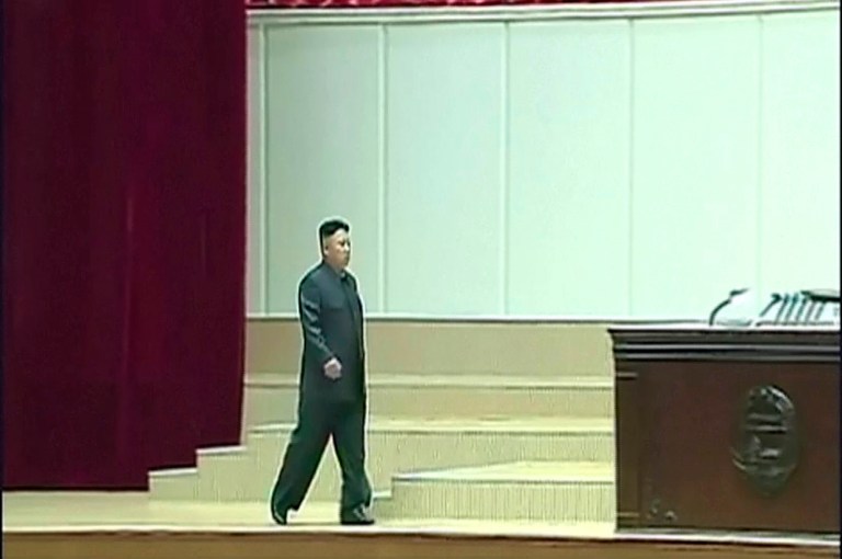 In this Tuesday, July 8, 2014 image made from video, North Korean leader Kim Jong Un arrives for a commemoration ceremony to mark the 20th anniversary of the death of its first leader, Kim Il Sung, in Pyongyang, North Korea. Kim seemed to have somehow hurt his leg enough to require a slight, but visible, limp as he marched across the stage Tuesday to assume his position of honor. He limped again as he left the room when the event was over. (AP Photo/KRT via AP Video) TV OUT, NORTH KOREA OUT