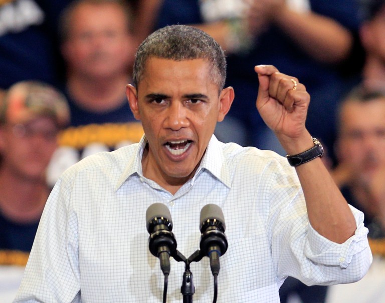 President Barack Obama speaks at a campaign event at Scott High School Monday, Sept. 3, 2012, in Toledo, Ohio. (AP Photo/Tony Dejak)