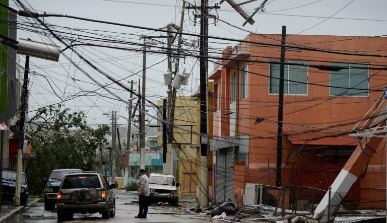 Puerto Rico's governor said that most businesses have shut down in the wake of the storm. He said that is putting the already fiscally shaky island under even more pressure. (AP Photo/Carlos Giusti, File)