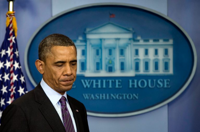 President Obama arrives to speak in the briefing room of the White House in Washington, Thursday, Dec. 5, 2013, about the death of Nelson Mandela. Obama says the world has lost an influential, courageous and 'profoundly good' man with the death of anti-apartheid icon Mandela. (AP Photo/Carolyn Kaster)