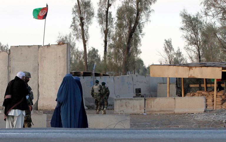 An Afghan official says the Taliban have launched an attack at the airport in the southern city of Kandahar, where clashes are still underway. (AP Photos/Allauddin Khan)