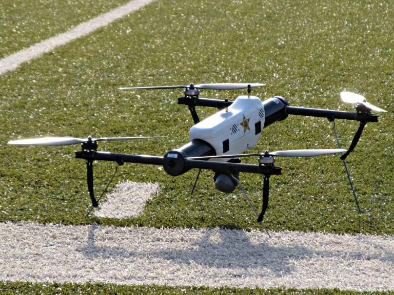 FILE - In this May 14, 2013 file photo, one of several small drones designed for use by law enforcement and first responders is shown at University of North Dakota in Grand Forks, N.D. Thirteen leading news organizations are challenging the Federal Aviation Administration's ban on journalists' use of drones, saying it violates First Amendment protection for news gathering. The organizations, including The Associated Press, filed a brief with the National Transportation Safety Board Tuesday, May 6 in support of aerial photographer Raphael Pirker. (AP Photo/Minnesota Public Radio, Dan Gunderson, File)