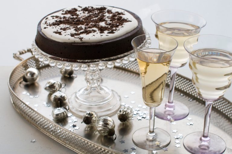   In this image taken on Nov. 26, 2012, a flourless chocolate cake is shown served on a cake stand in Concord, N.H. (AP Photo/Matthew Mead)  