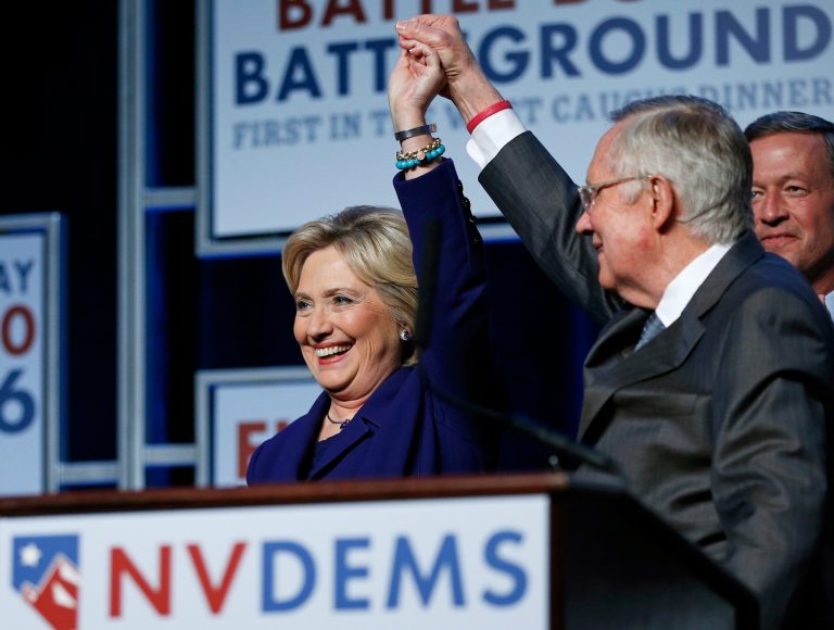 Reid is now the highest-ranking Democrat supporting the former secretary of state's primary campaign. (AP Photo/John Locher)